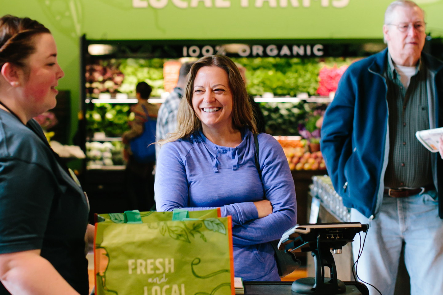 happy customers shopping new leaf