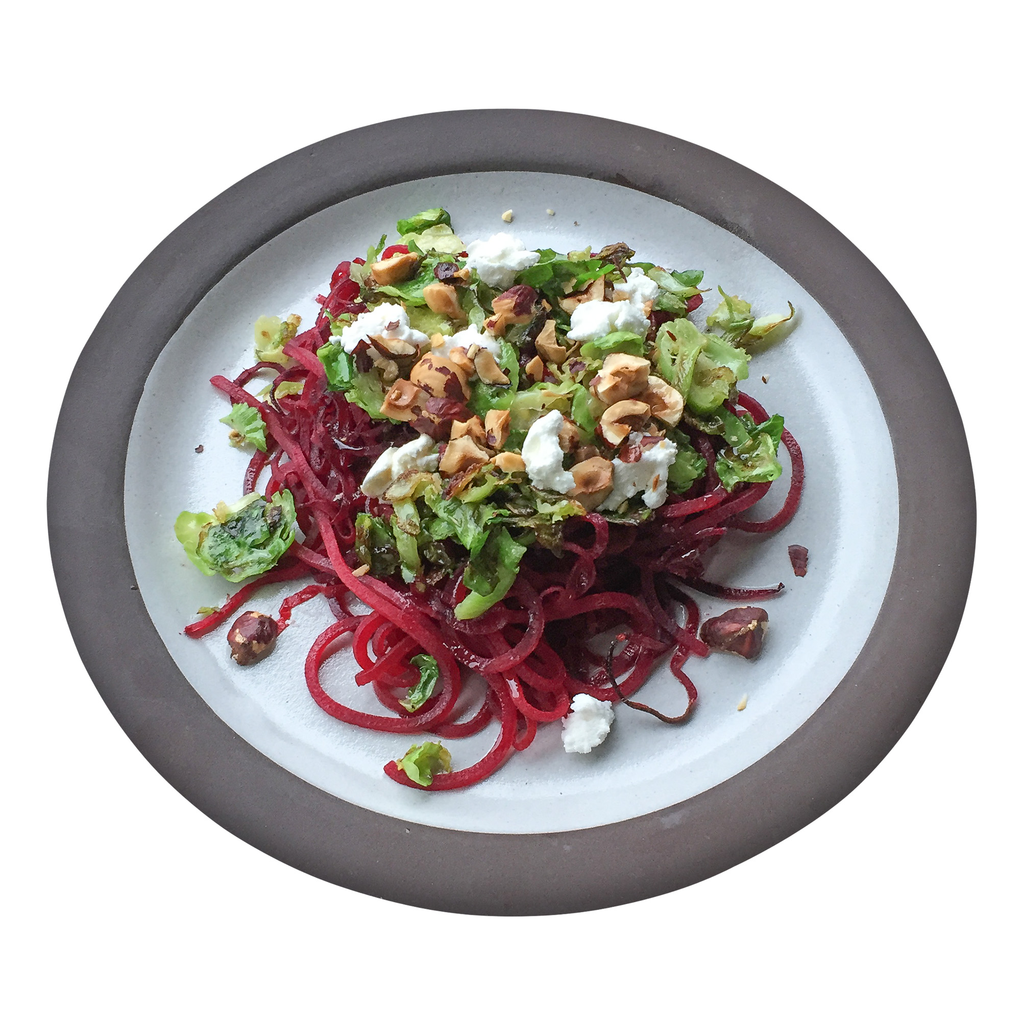spiralized beet and brussels salad with hazelnuts